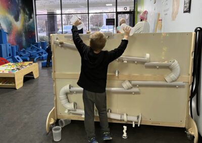 Building tracks and tunnels to roll ball down